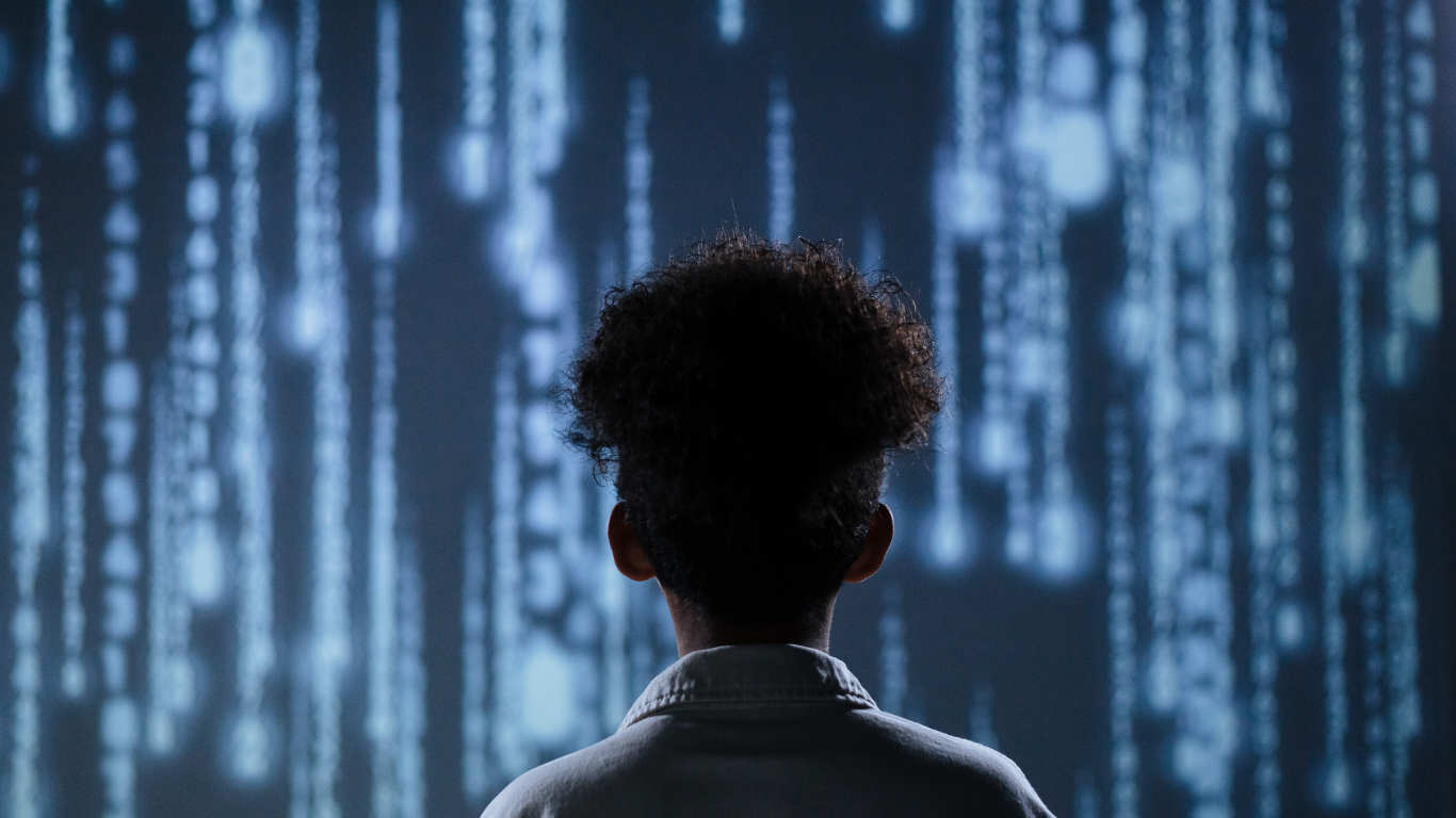 Developer working alongside AI agents, representing the future of collaborative IT teams